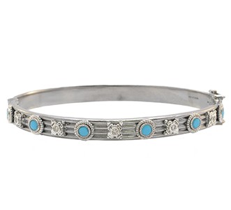 A sterling silver and turquoise bangle from Armenta