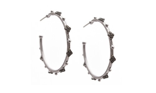 Sterling silver hoops by Armenta featuring dark gemstones