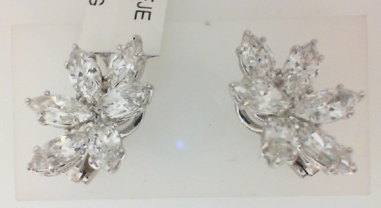A pair of white gold and diamond earrings, featuring stones arranged to resemble a flower