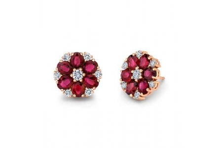 A pair of floral Norman Silverman stud earrings, available at Clarkes Jewelers.